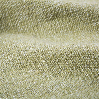 Close-up of the HKliving Soft Woven Throw With Black Tufted Lines by HKliving, showing its textured green fabric with a cosy, slightly bumpy surface and raised pattern highlighted by gentle folds and shadows.