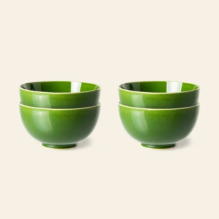 Two sets of HKliving The Emeralds Ceramic Dessert Bowls, Set of 4, featuring a subtle geometric design, are arranged side by side on a plain light background.