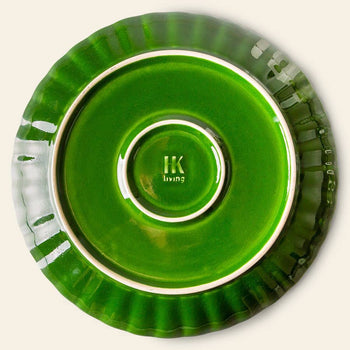The HKliving The Emeralds: Ceramic Dinner Plate Ribbed, Set of 2 features vibrant emerald green plates with glossy finishes, ribbed edges, and the HKliving logo embossed on the circular base—perfect for serving stylish small meals.
