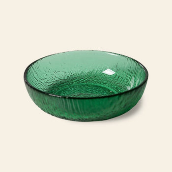 The HKliving The Emeralds: Glass Dessert Bowl features a round, shallow design with a textured, wavy green glass surface, adding modern elegance to any setting. Brand: HKliving.