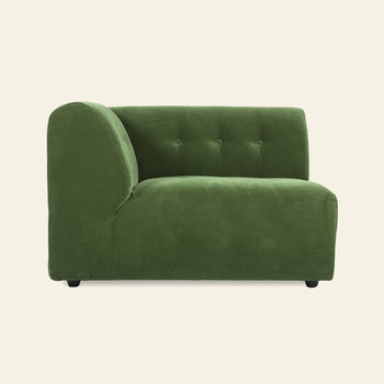 The HKLIVING Vint Couch, Left, 1.5-Seat by HKLIVING is a modern green velvet armless sofa with a tufted backrest, spacious design, rounded edges, and low black legs set against a plain beige background.