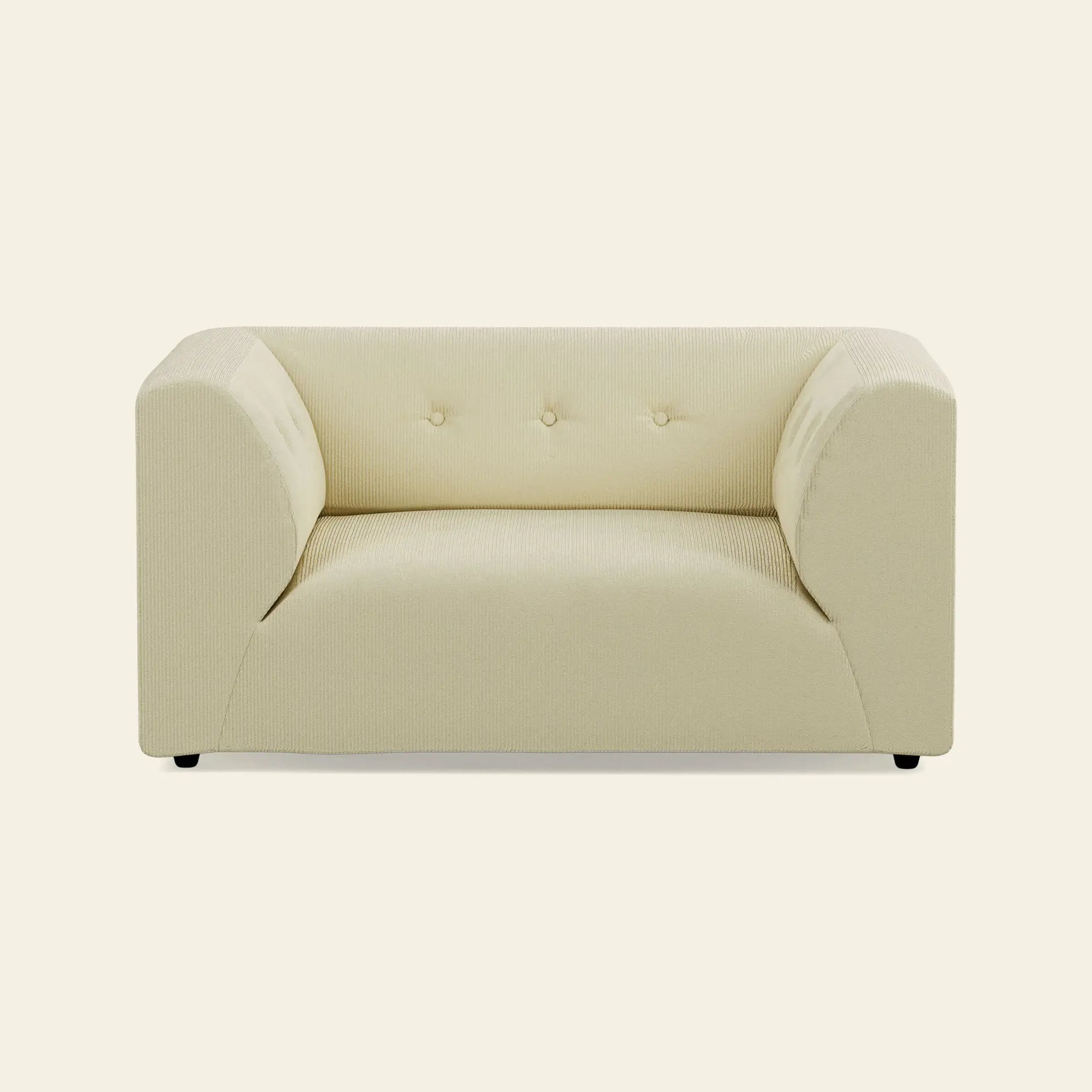 The HKLIVING Vint Couch Loveseat by HKLIVING features a modern, cream upholstery, boxy silhouette, low arms, three tufted back buttons, and short black legs, shown against a plain beige background.
