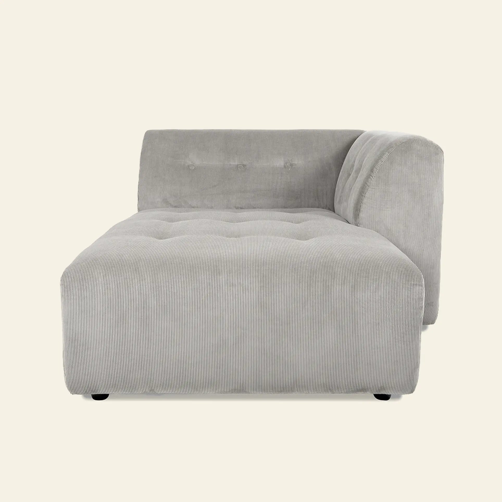 The HKLIVING Vint Couch, Right Divan by HKLIVING is a modern light gray corduroy sofa featuring a tufted seat and single right-side backrest, displayed against a plain off-white background.