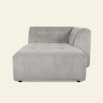 The HKLIVING Vint Couch, Right Divan by HKLIVING is a modern light gray corduroy sofa featuring a tufted seat and single right-side backrest, displayed against a plain off-white background.