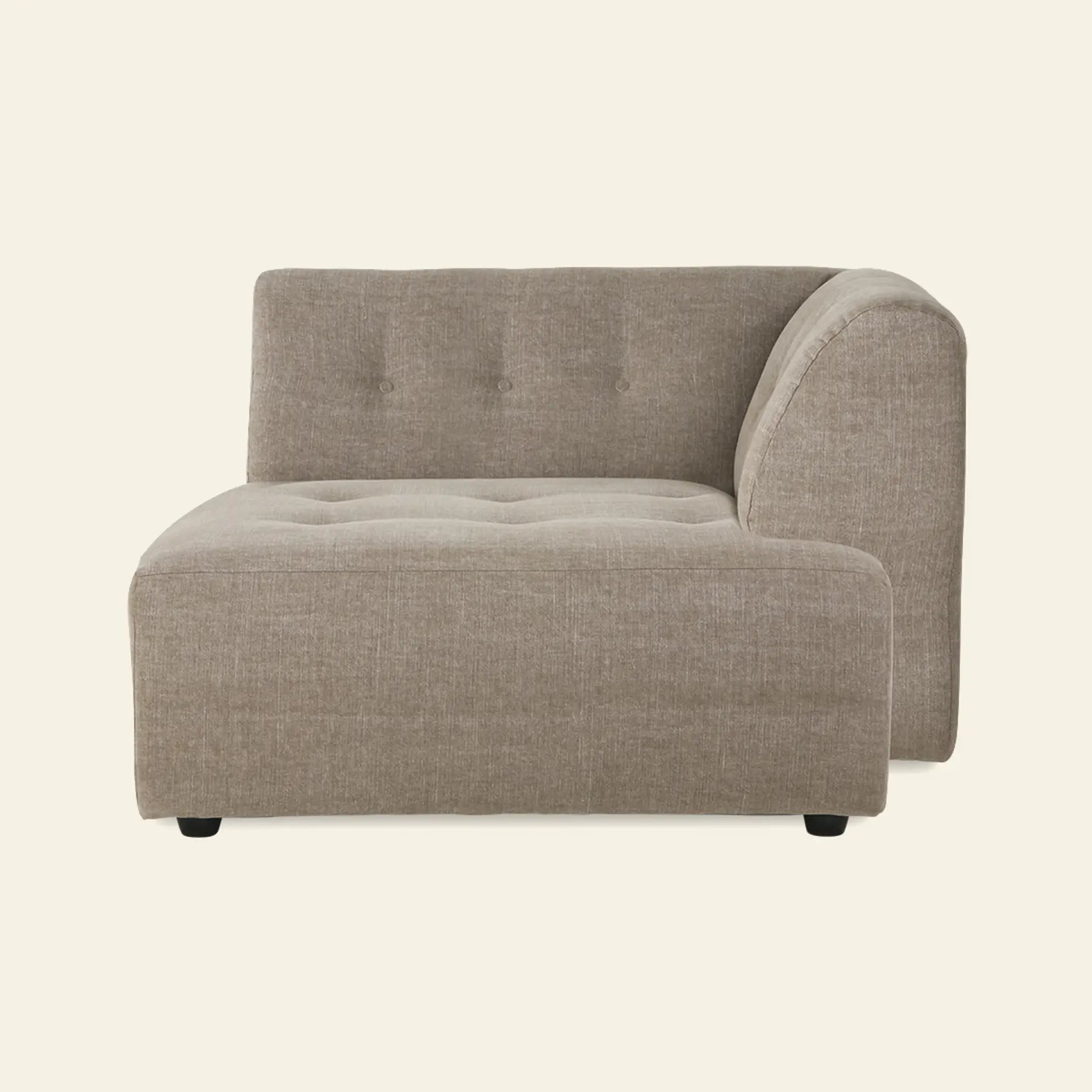 The HKLIVING Vint Couch, Right Divan by HKLIVING features a light brown, tufted design with a low back and right-side armrest, set against an off-white background. This modular sofa offers customizable seating for your space.