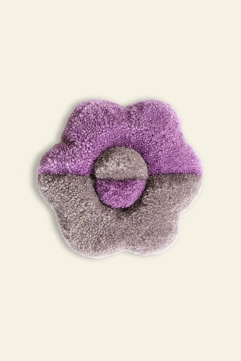 The Habichl Tufted Coasters by Habichl feature a plush, flower-shaped design with purple and gray petals and a round center, all set against a cream background for unique charm.