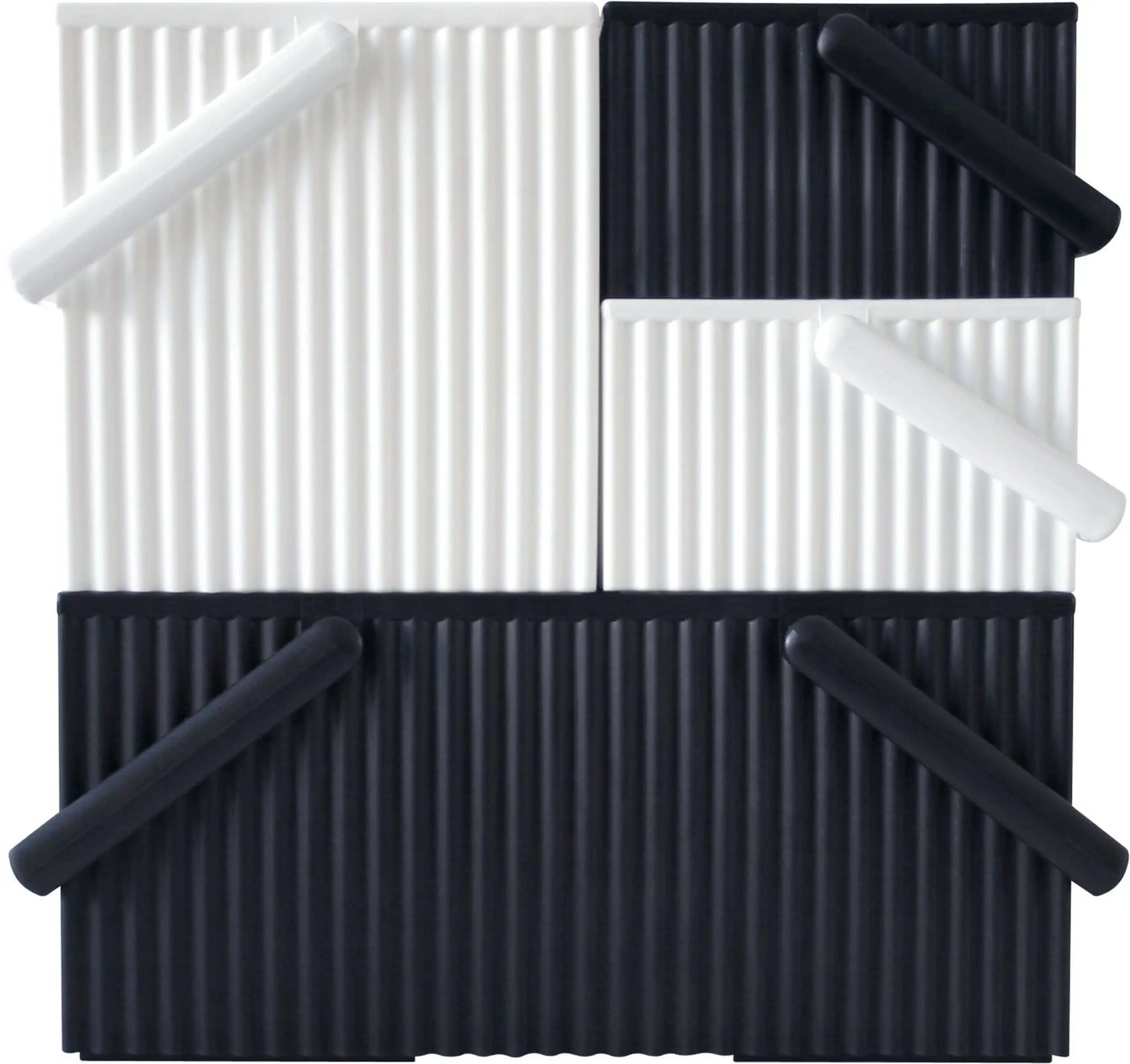 The Hachiman Omnioffre Stackable Storage Box S by Hachiman offers a modern, geometric design with bold black and white panels, vertical ridges, and cylindrical accents—perfect for adding abstract style to contemporary spaces.