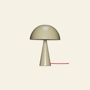 A beige Hübsch Mush Table Lamp Mini by Hübsch, featuring a conical base and dome shade with a red power cord, sits on a light background—an ideal modern accent, available in multiple colors.