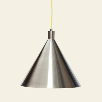 The Hübsch Yama Pendant by Hübsch is a metallic, cone-shaped light with a brushed finish, suspended from a yellow cord—ideal for bringing modern elegance to any space.