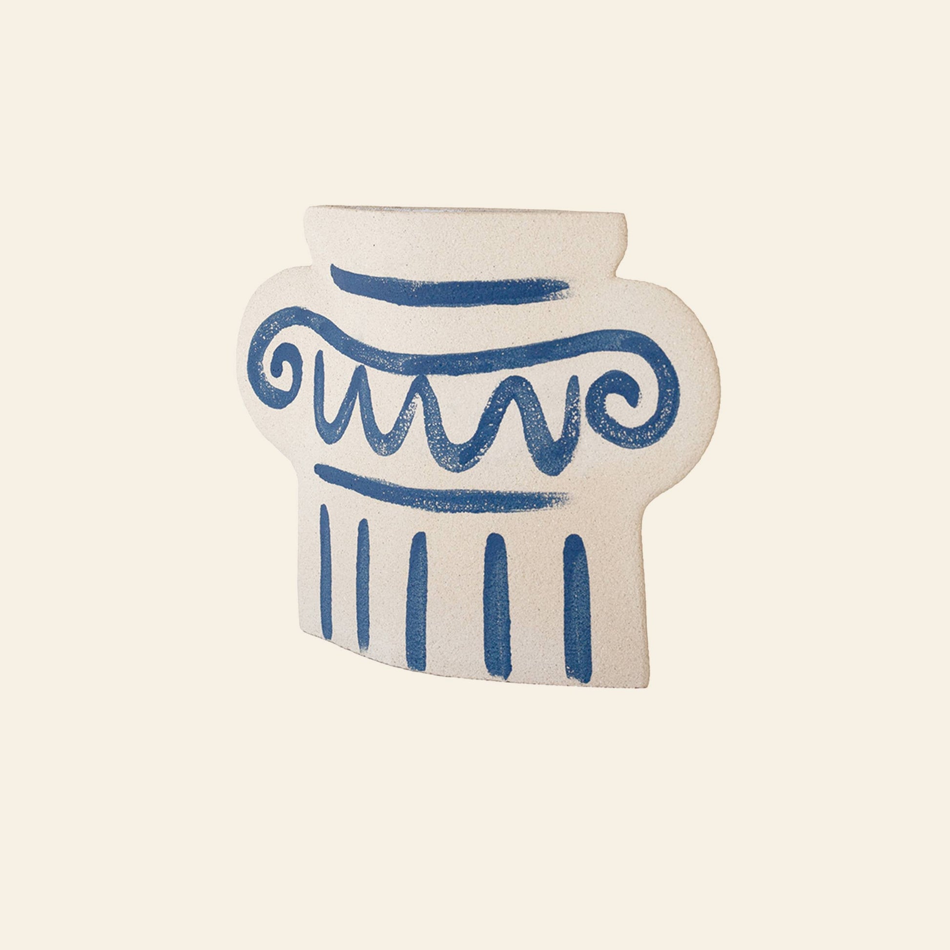 The INI CERAMIQUE Greek Column Ceramic Vase is a flat, white handcrafted vase with blue scroll and vertical line details, inspired by ancient Greek columns. Shown against a light beige background.