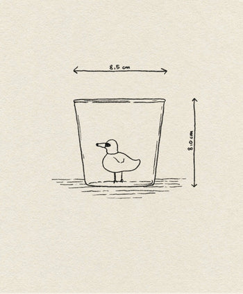 A whimsical line drawing of the Ichendorf Milano Animal Farm Tumbler, 8.5 cm wide and 8 cm tall, featuring a small duck inside. Part of the charming collection by Ichendorf Milano.
