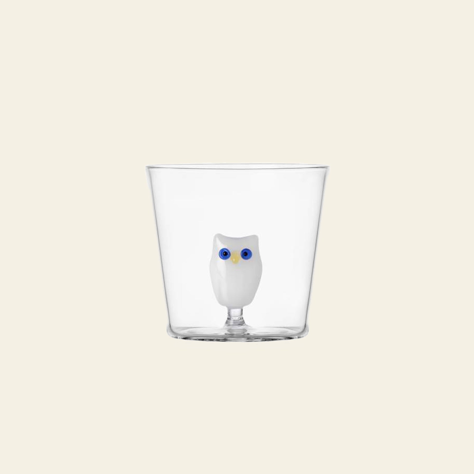The Ichendorf Milano Animal Farm Tumbler by Ichendorf Milano features a small white owl with blue eyes at its base, displayed against a plain beige background.