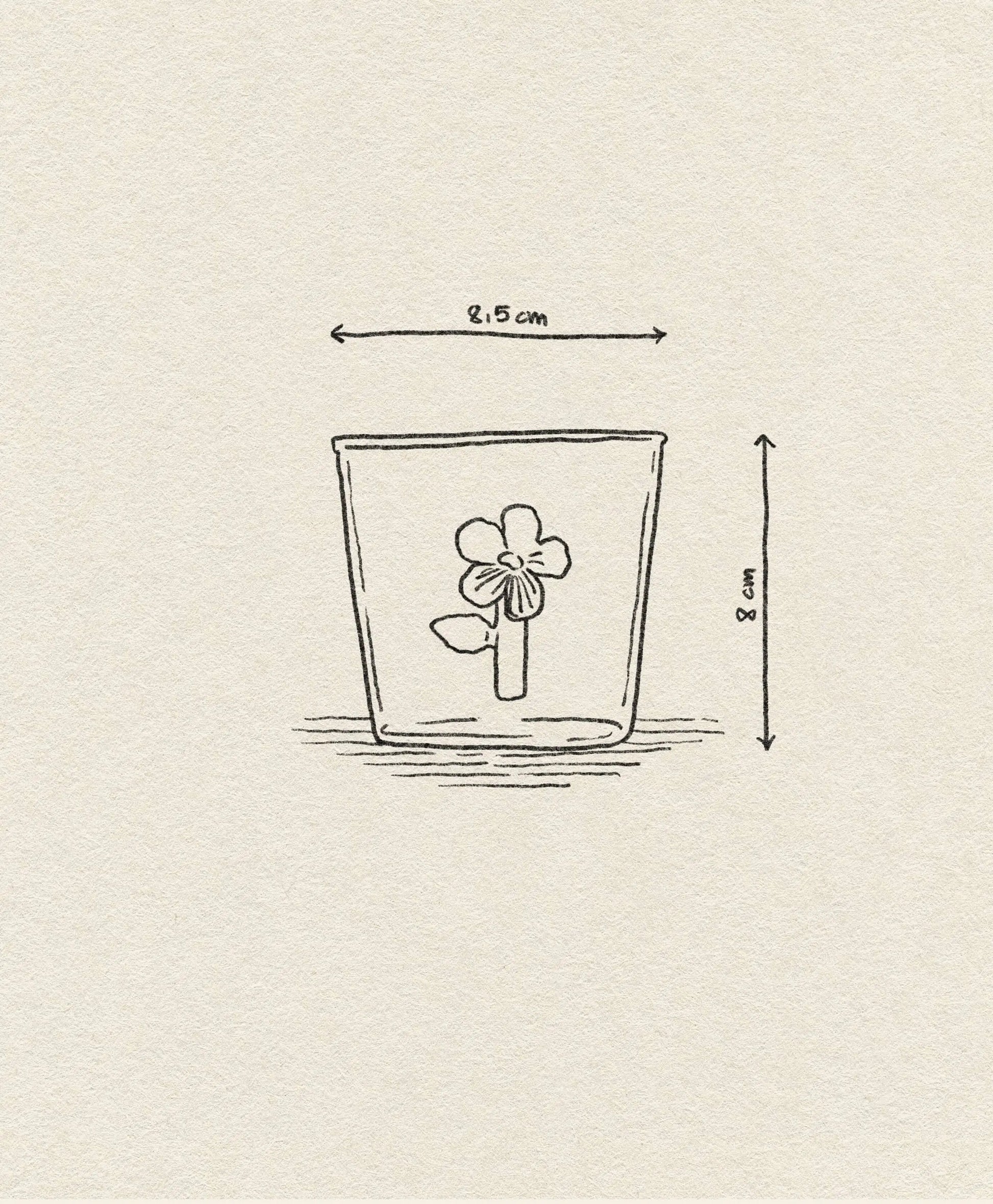 A simple line drawing of a flower in a glass (8 cm tall, 8.5 cm wide) adds nature-inspired charm to the textured off-white background—ideal for the Ichendorf Milano Botanica Tumbler - Lilac by Ichendorf Milano.
