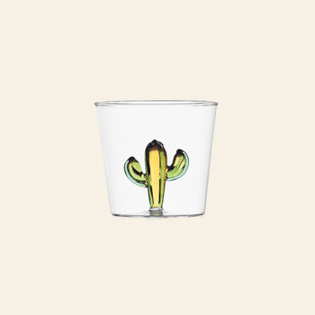 The Ichendorf Milano Desert Plants Tumbler by Ichendorf Milano features a small green and yellow cactus motif at the base, set against clear glass for a simple, elegant look.