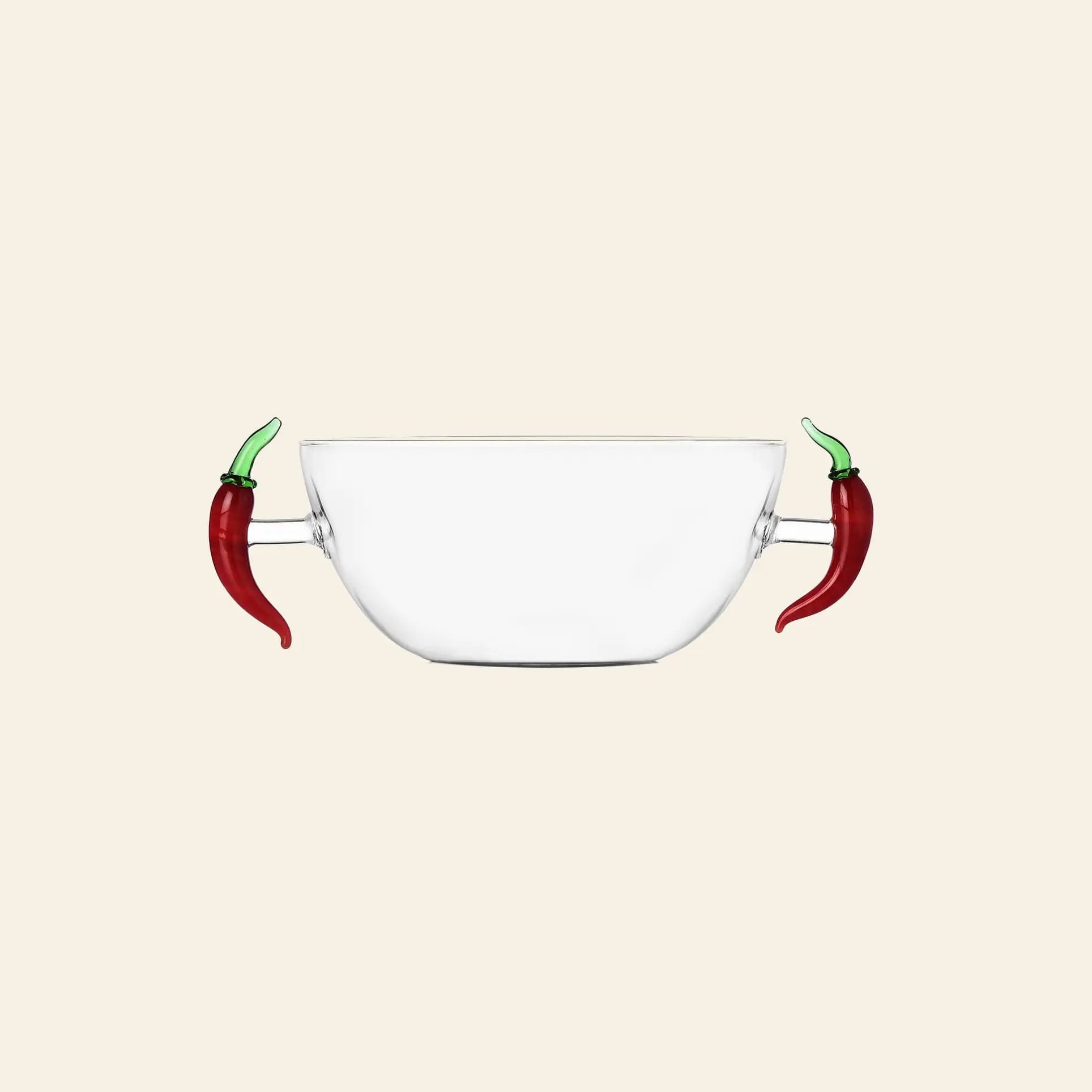The Ichendorf Milano Vegetables Bowl by Ichendorf Milano features two red chili pepper-shaped handles with green stems, crafted from clear glass, and is showcased against a plain beige background.