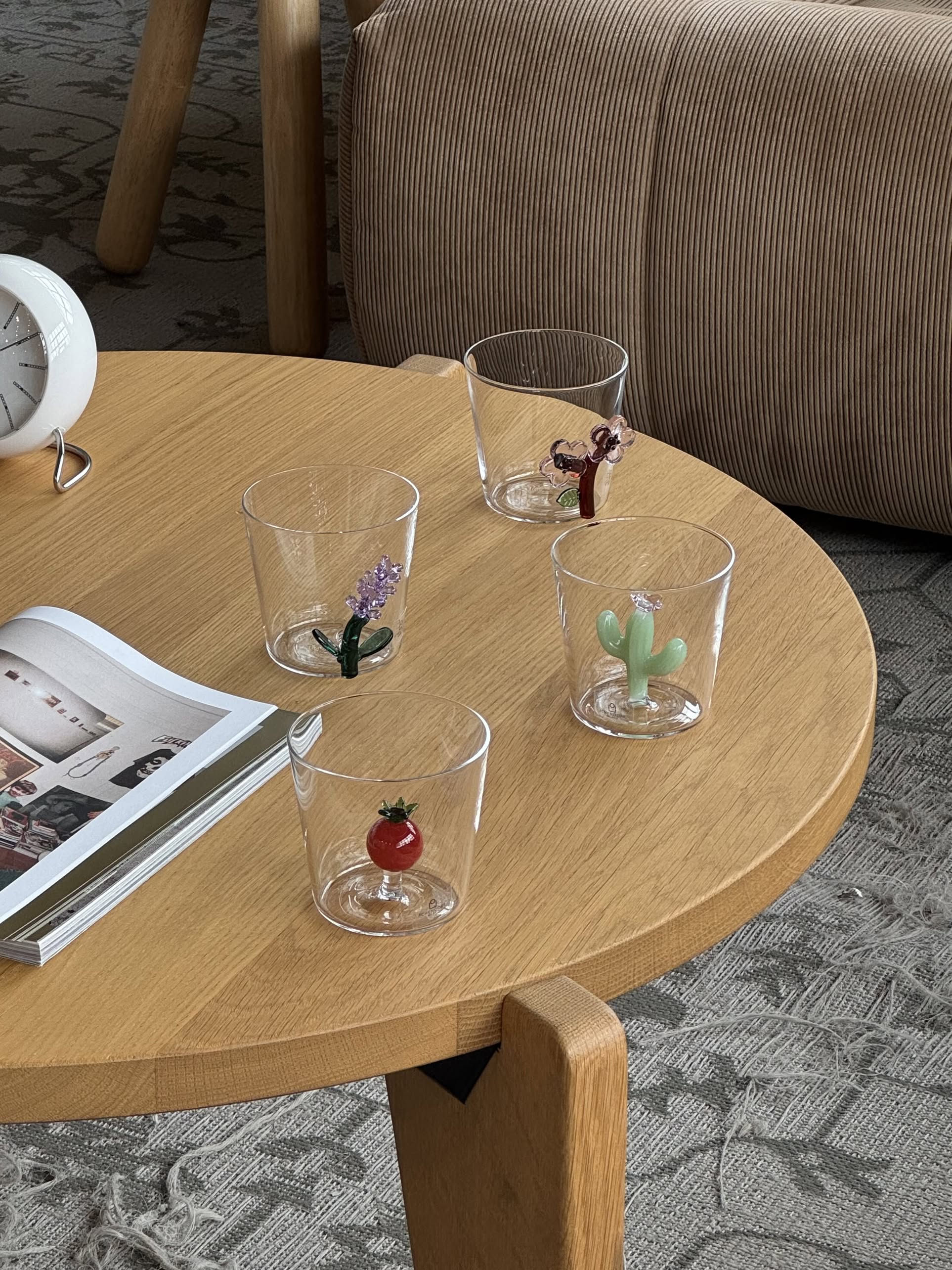 The Ichendorf Milano Vegetables Tumbler set by Ichendorf Milano features four hand-blown glass cups, each with a unique fruit or vegetable design—an eye-catching collection for your coffee table and a perfect unique gift.