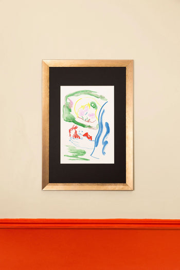 A framed limited edition KIBLIND Atelier Gaelle Loth - Ponyo on the Cliff print by KIBLIND Atelier with colorful brushstrokes hangs on a beige wall above red-orange wainscoting.