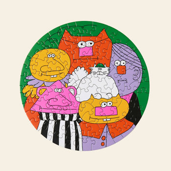 The Le Puzz The Flumpsteins 81 Piece Puzzle by Le Puzz forms a round image of six vibrant cartoon animals, including Snowball the cat, all grouped on a green and cream background, ready for adventure.