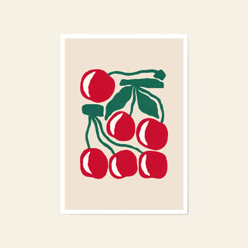 Liv Lee Cherries (Cream) by Liv Lee features six bright red cherries with green stems and leaves on a beige background. This A3 archival-quality giclée print is produced on premium Hahnemühle stock, finished with a white border.