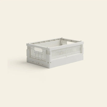 The Made Crate Mini by Made Crate is a white recycled plastic rectangular storage crate featuring vented sides, handles, and stackable design, shown on a plain light background.