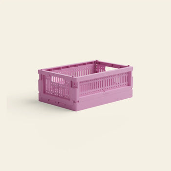 The Made Crate Mini by Made Crate is a light purple, eco-friendly folding crate crafted from recycled plastic, shown assembled and empty on an off-white background—ideal for stacking and sustainable storage.