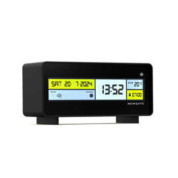 The Newgate Futurama LCD Alarm Clock features a black case, backlit yellow and white screen displaying time, date, indoor temperature, weather icons, and alarm. NEWGATE is printed on the front for a stylish look.