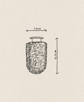 A hand-drawn sketch of the Normann Copenhagen Ballo Brush Head, labeled with its dimensions on off-white paper; a unique detail perfect for any modern home décor enthusiast.