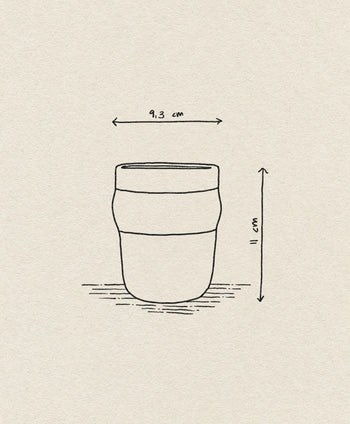 A simple line drawing of the Normann Copenhagen Obi Mug by Normann Copenhagen, measuring 9.3 cm wide and 11 cm tall, displayed on a textured beige background.