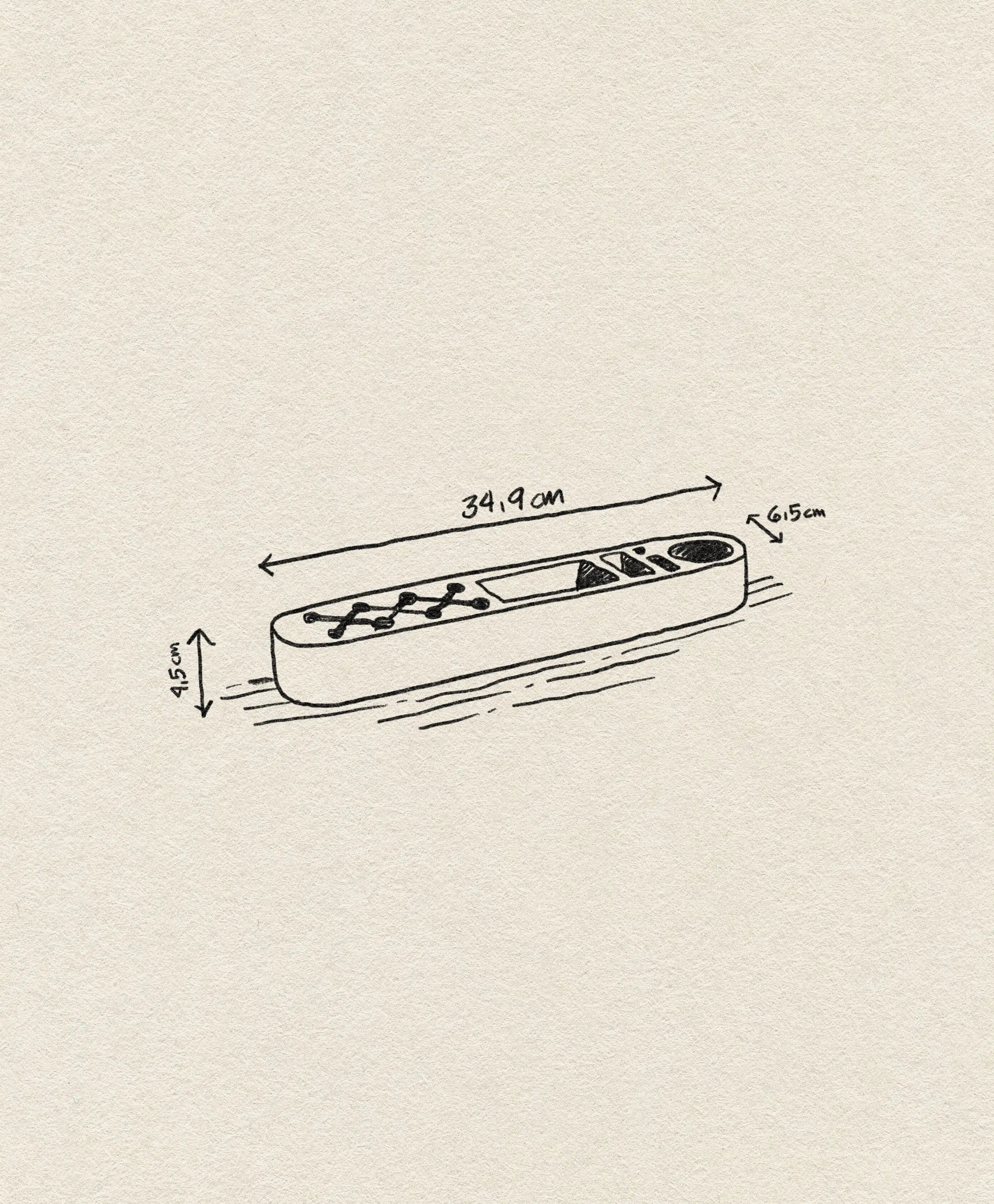 A hand-drawn illustration of the Normann Copenhagen One Piece Organizer Classic by Normann Copenhagen, shaped like a remote with buttons and a display. It measures 34.9 x 6.5 x 1.5 cm—a sleek, colorful way to store your essentials.