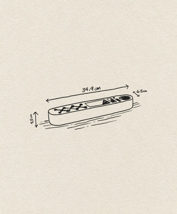 A hand-drawn illustration of the Normann Copenhagen One Piece Organizer Classic by Normann Copenhagen, shaped like a remote with buttons and a display. It measures 34.9 x 6.5 x 1.5 cm—a sleek, colorful way to store your essentials.