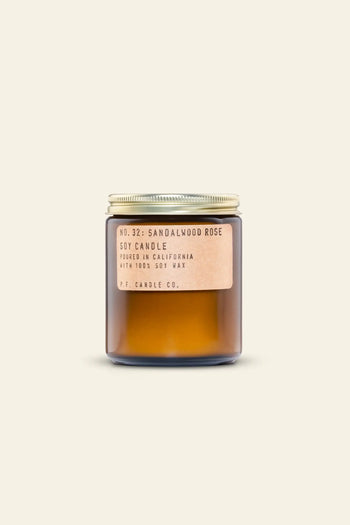 P.F. Candle Co. No. 32 Sandalwood Rose 7.2 oz Soy Candle features a brown glass jar with a gold metal lid and tan label, highlighting this hand-poured, 100% soy wax candle by P.F. Candle Co., made in California.
