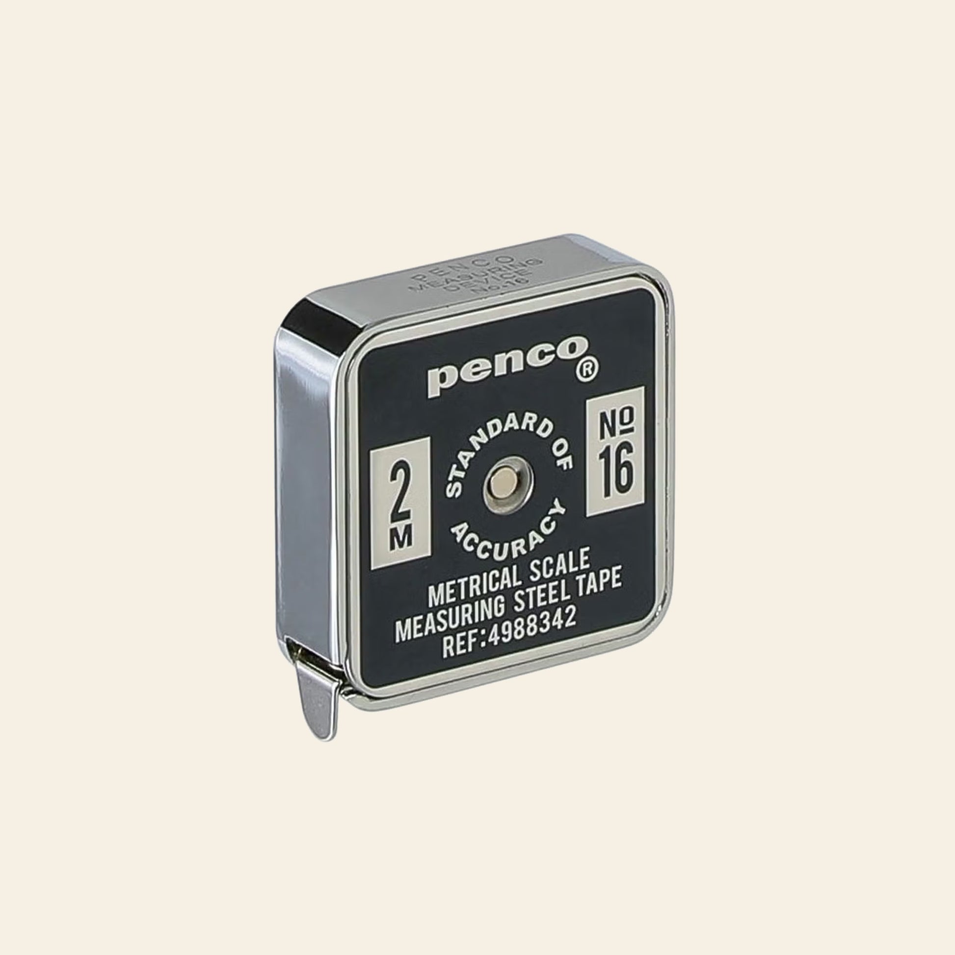 The Penco Pocket Measure by Penco is a compact, square tape measure crafted from stainless steel in silver and black. Featuring a 2-meter metric scale and “No. 16” displayed on the front, its retro-inspired design channels vintage tape measures, with the end hook visible at the bottom left.