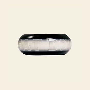 The Plastic Ark Fat Bowl by Plastic Ark is a black and white round plastic pet bowl with “FAT BOWL” embossed on the side, shown on a light beige background. Customize its design to match your style.