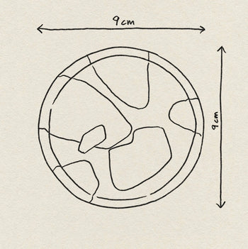 The Poketo Bamboo Coasters, Set of 4, feature hand-drawn circular designs with irregular sections and measure 9 cm in diameter. Each coaster is shown on a plain background.