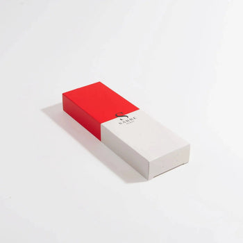 A rectangular box with a red top and white bottom displays Sabre and a small black icon, evoking French cafe style. The Sabre Bistrot Vintage Soup Spoon packaging rests on a plain white surface.