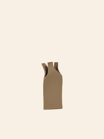 The Serax Flower Bottles Vase XS - Brown, by Serax, is a small minimalist ceramic vase with three narrow uneven spouts, shown centered on a plain light beige background.
