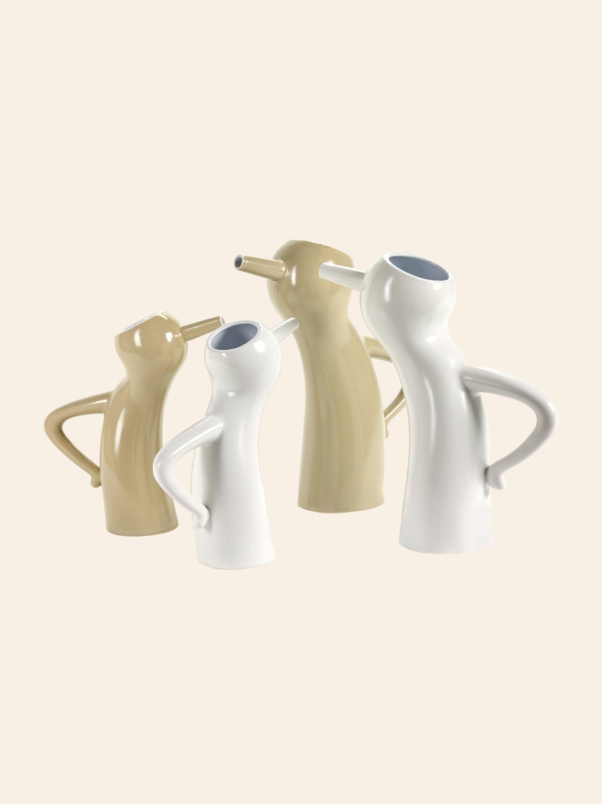 The Serax Monsieur Cruchot Jug L in taupe features a unique abstract human-like form with a curved handle and tilted spout, making it a versatile and stylish home decor accent.