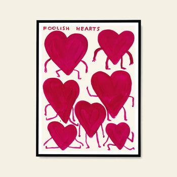 The Shrig Shop David Shrigley - Foolish Hearts (50x70) print features eight playful red hearts with arms and legs, labeled FOOLISH HEARTS on a white background—a whimsical framed illustration for any poster collection.