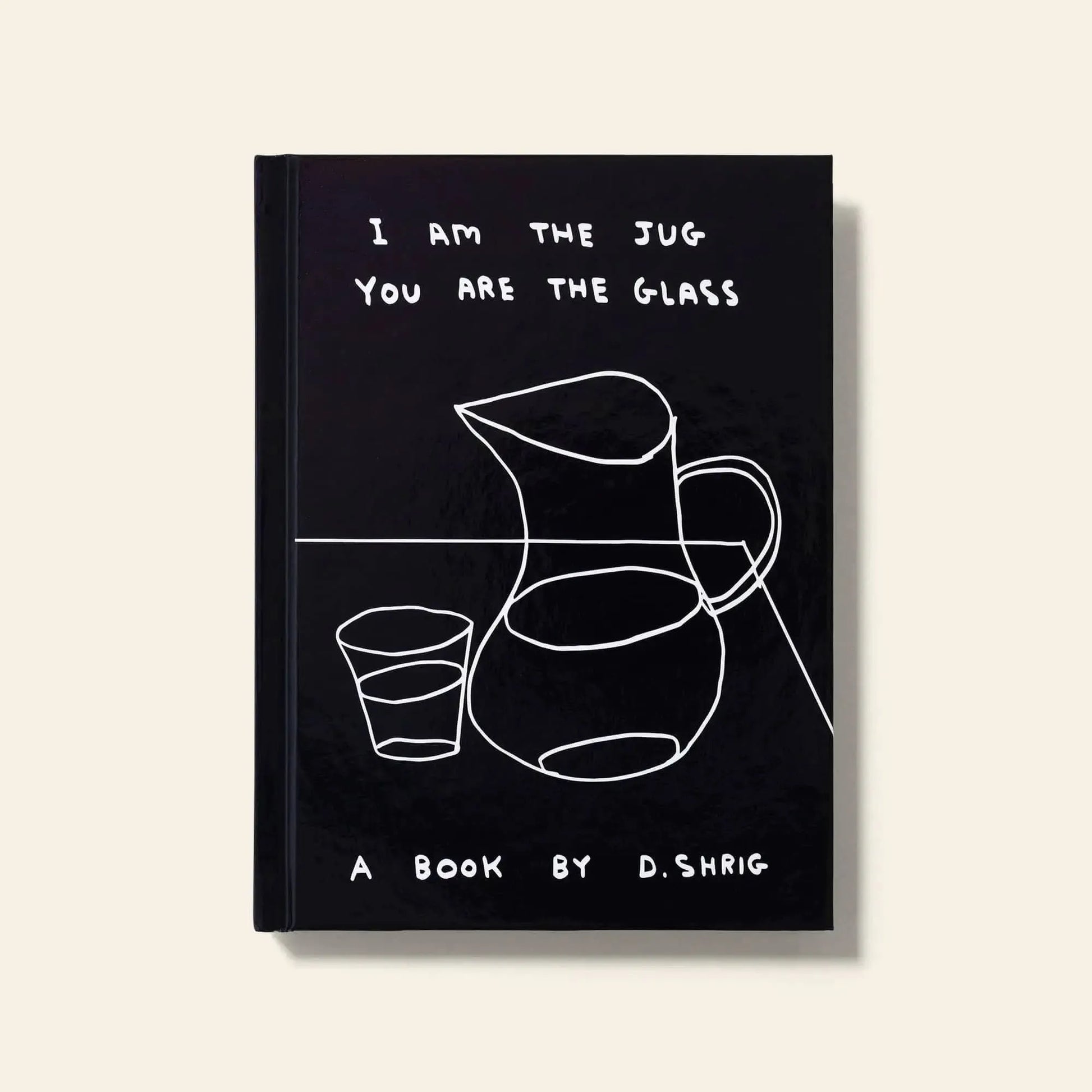 The Shrig Shop “I Am The Jug You Are The Glass” limited edition book features a black cover with white line art of a jug and glass, reminiscent of classic black-and-white sketches.