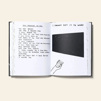 An open Shrig Shop David Shrigley - I Am The Jug You Are The Glass book by Shrig Shop shows a handwritten poem on mending someone, with black-and-white sketches—a rectangle and a hand with a remote—against a beige background.