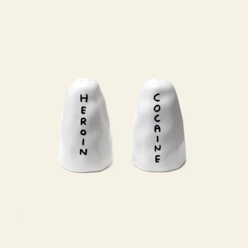 The Shrig Shop Heroin and Cocaine Porcelain Shakers by Shrig Shop are quirky white collectibles labeled with bold text—perfect for making a statement.