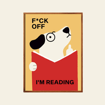 The Stacked Store Fuck Off Im Reading - Woofliam Shakespeare Poster (30x40) features a dog with glasses holding a red book, flipping the bird, with bold text on yellow—ideal wall art for bookworms and dog lovers.