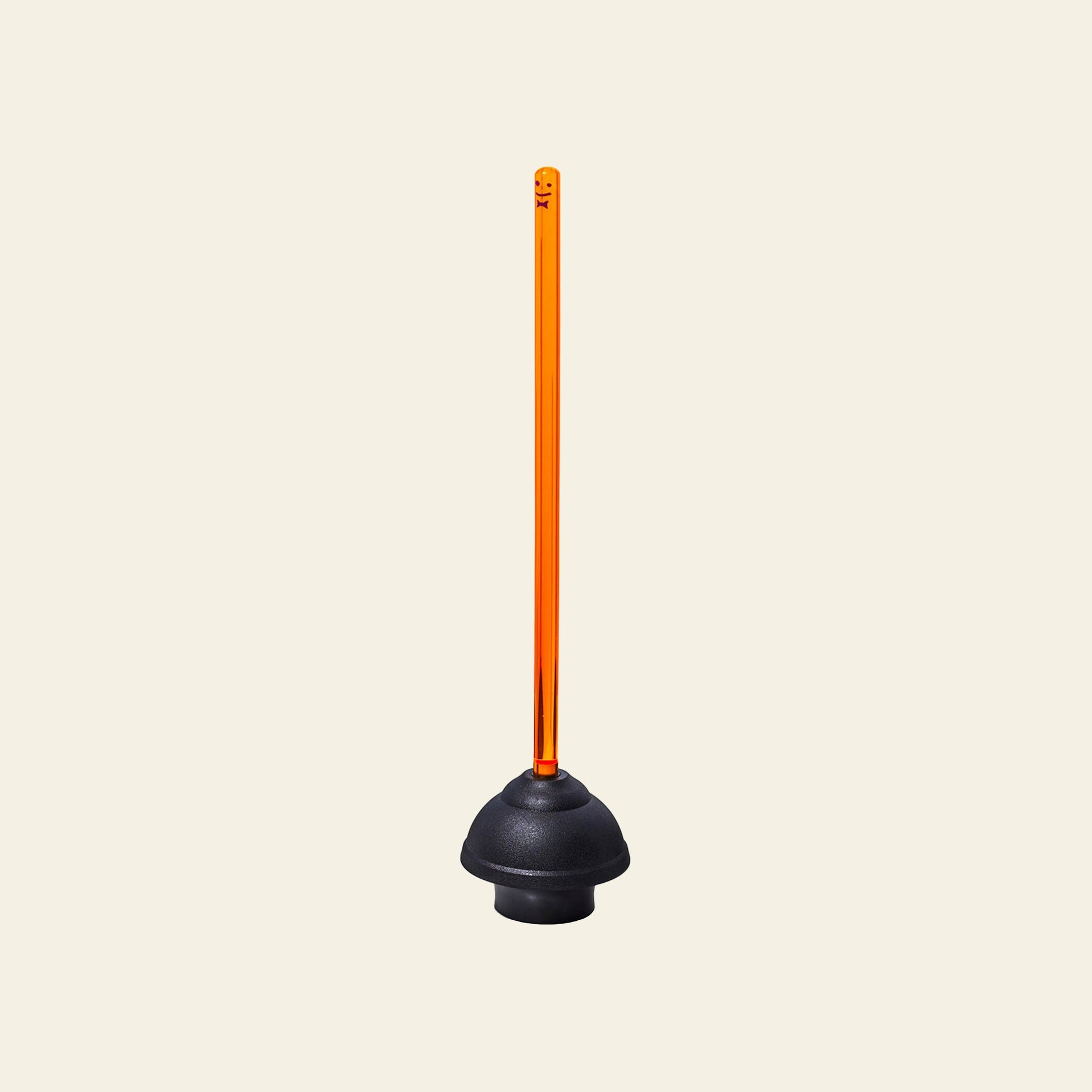 Staff The Plunger by Staff features a black rubber cup with a long, straight, translucent orange handle, standing upright against a plain light beige background—a must-have bathroom essential for every home.