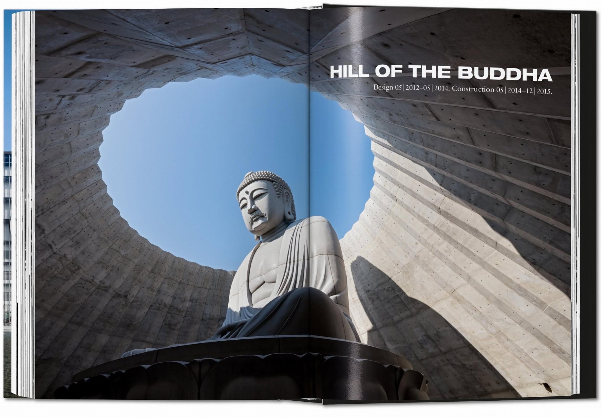 A large Buddha statue sits beneath a circular concrete opening with sunlight streaming in—a feature of Tadao Ando’s minimalist design, highlighted in TASCHEN Ando: Complete Works 1975-Today from TASCHEN.
