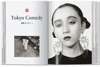 An open TASCHEN Araki book by TASCHEN displays a Tokyo Comedy spread with Japanese text, featuring a small black-and-white photo of a costumed person on the left and a dramatic close-up with ornate earrings on the right.