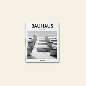 TASCHEN Bauhaus, published by TASCHEN, features a black-and-white cover image of modernist balconies, symbolizing the Bauhaus schools influence on creative expression. The publishers name appears at the bottom.