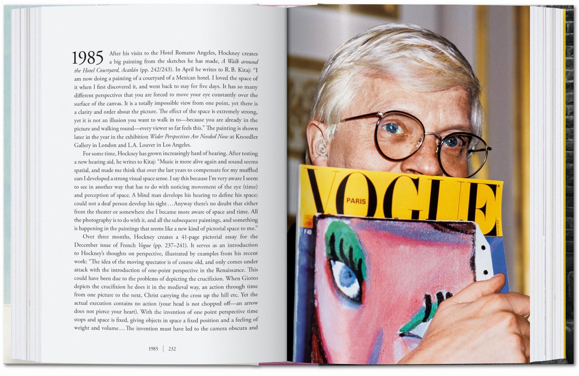 An open copy of TASCHEN David Hockney: A Chronology displays a photo of a short blond-haired person with glasses holding a Vogue Paris magazine, its colorful painted-face cover partially hiding their face, while text fills the left page.