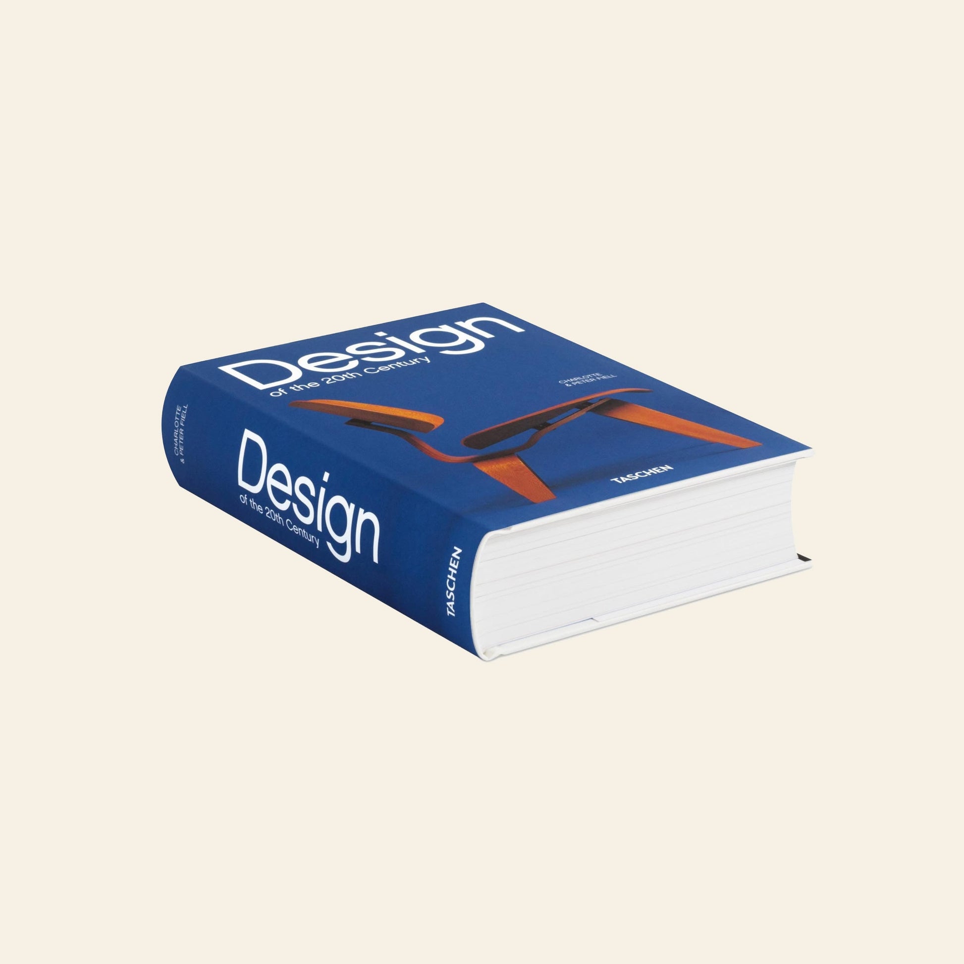 The TASCHEN Design of the 20th Century hardcover book by TASCHEN, featuring a blue cover with a modern chair image, rests on a plain light background.