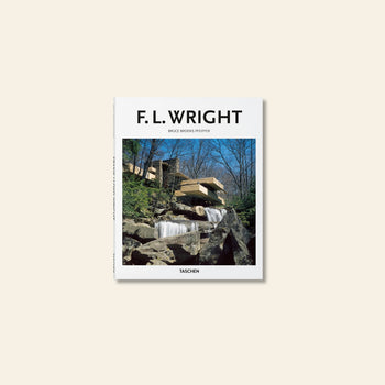 The TASCHEN F.L. Wright book cover by TASCHEN features Frank Lloyd Wright’s iconic Fallingwater house, showcasing modern organic architecture over a waterfall amid trees.