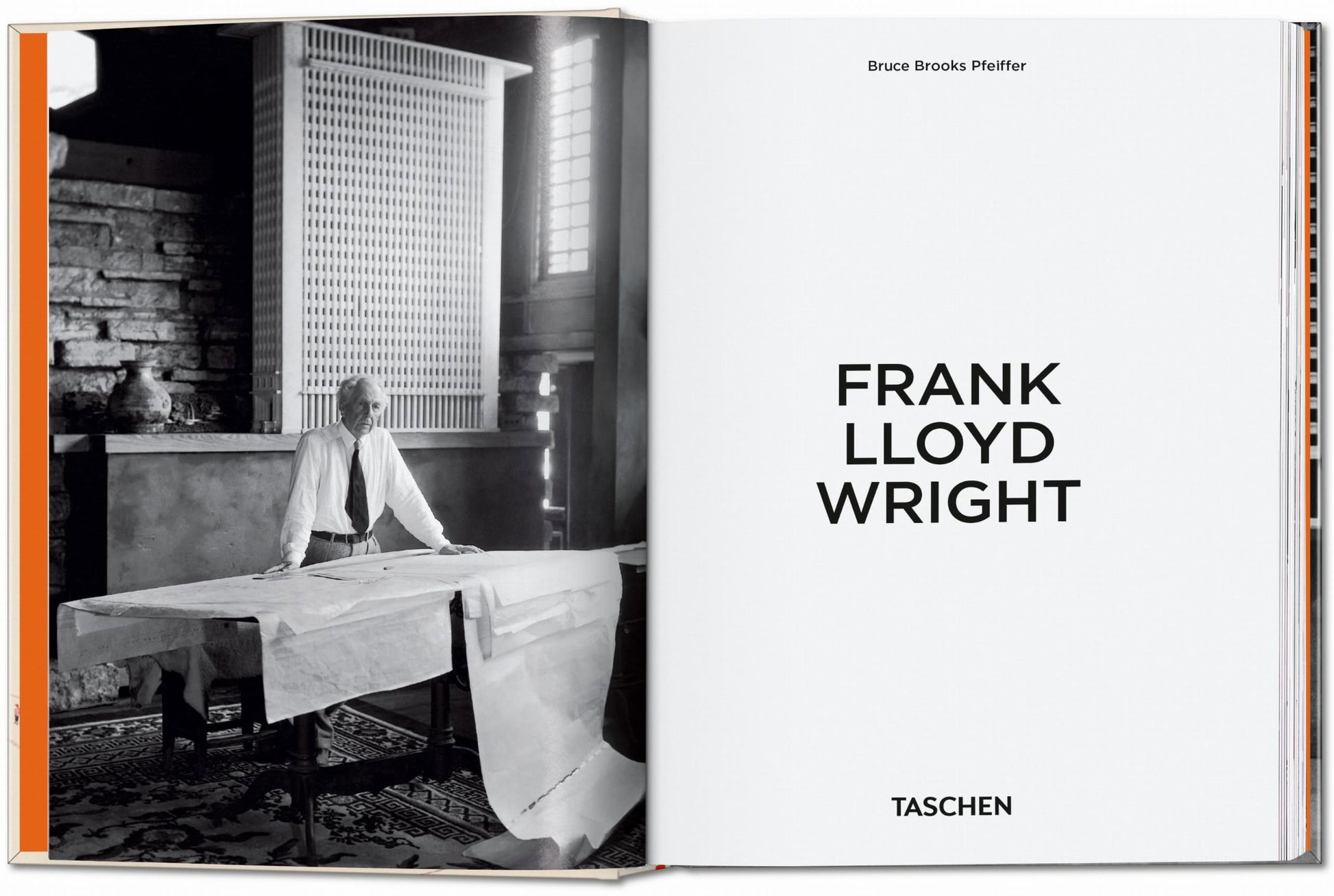 A black and white photo shows Frank Lloyd Wright at a table with architectural drawings. Opposite is the TASCHEN Frank Lloyd Wright book by Bruce Brooks Pfeiffer, celebrating his architecture. Brand: TASCHEN.